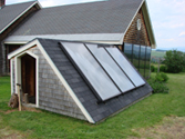 solar panels on a wood shed